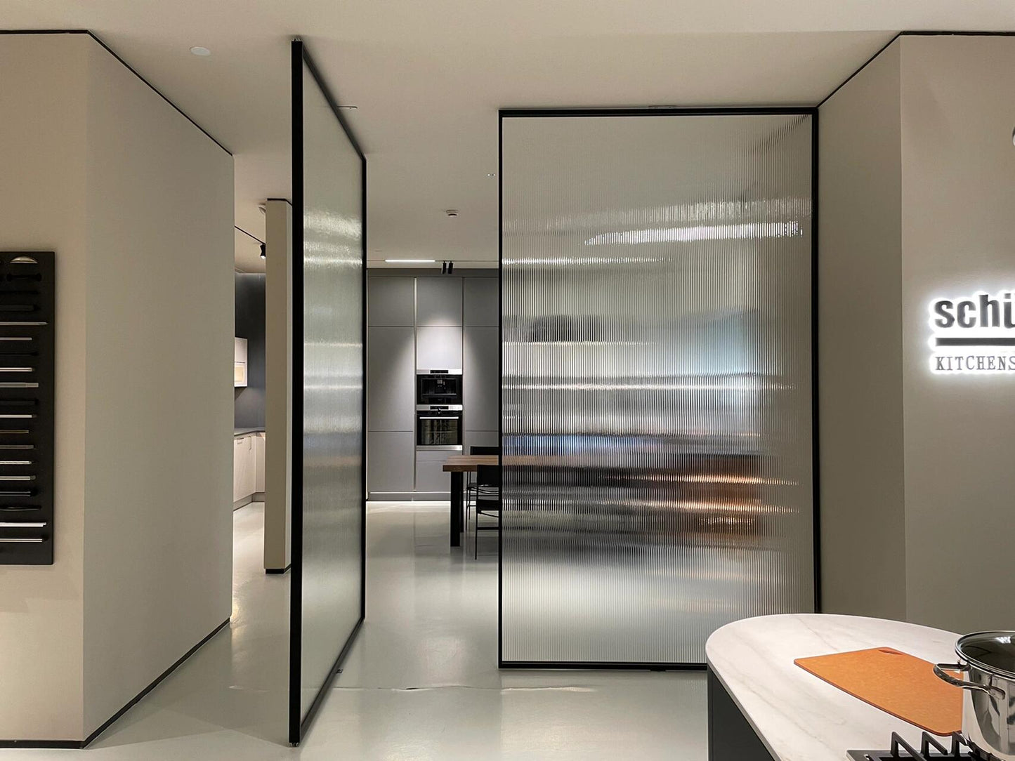 Central Pivot Glass Door with Ultra-Slim Frame & Electric Sliding Function